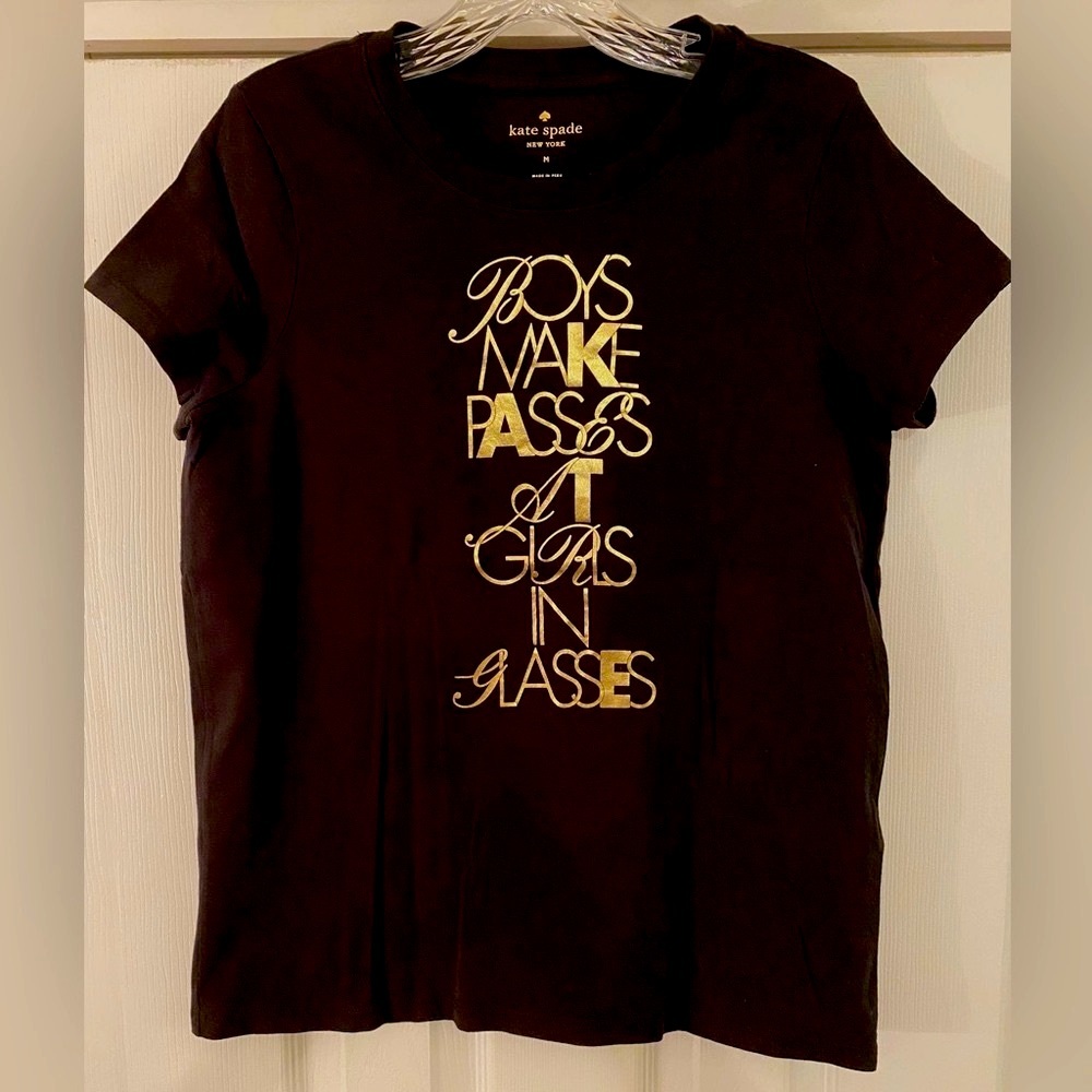 NWOT Kate Spade black cotton t-shirt. Metallic gold letters.